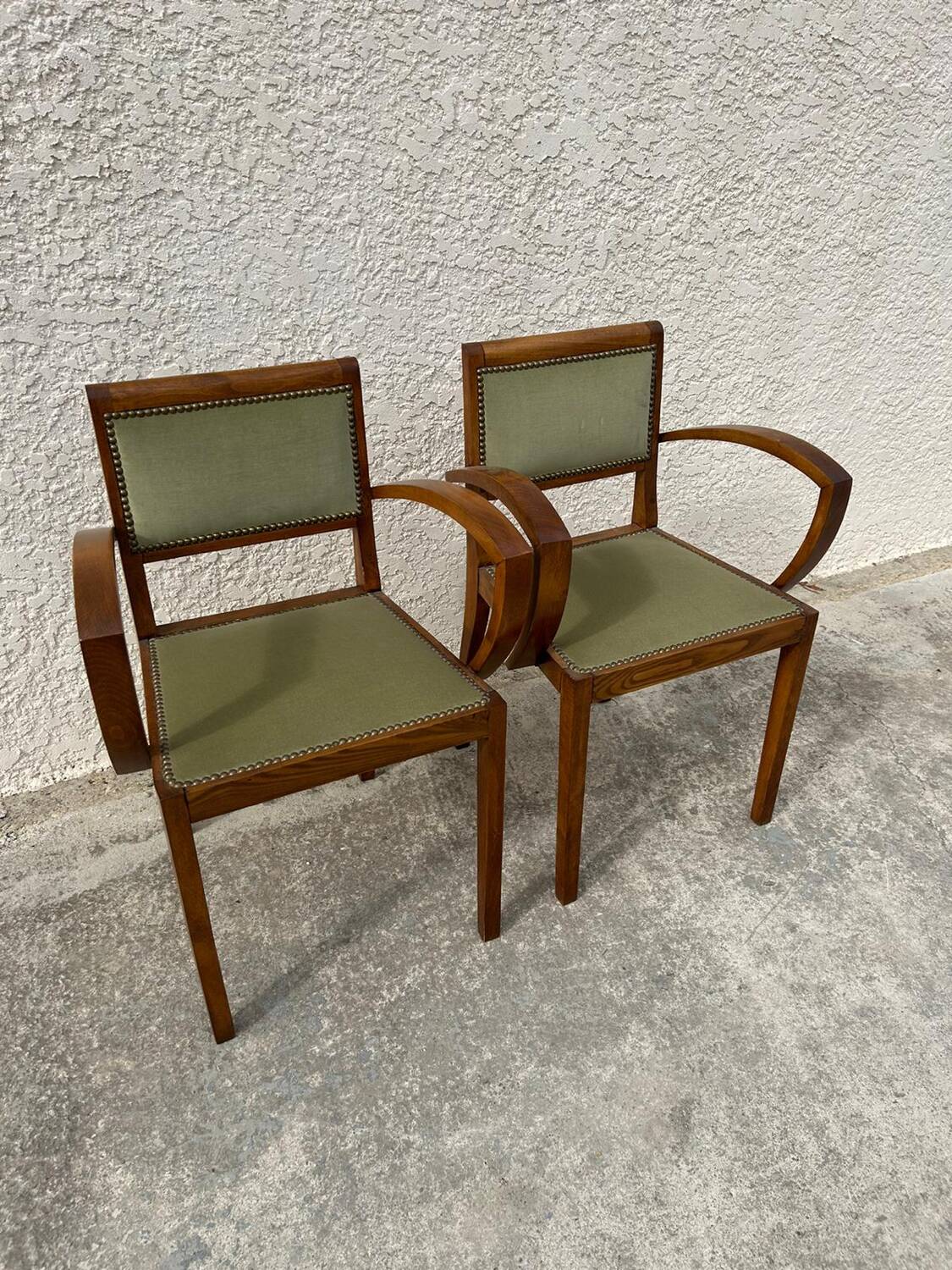 Pair of green velvet bridge armchairs