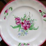 Three small hand-painted Saint-Clément dinner plates.