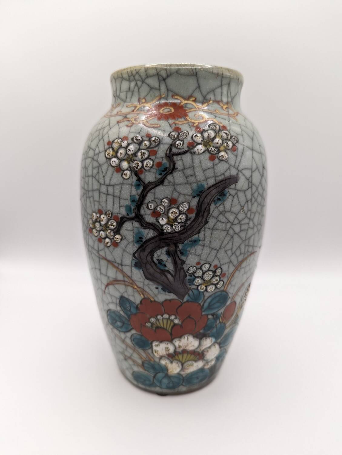 Asian ceramic vase with classic floral pattern