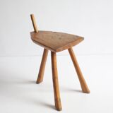 Brutalist tripod stool in carved wood, 1950s