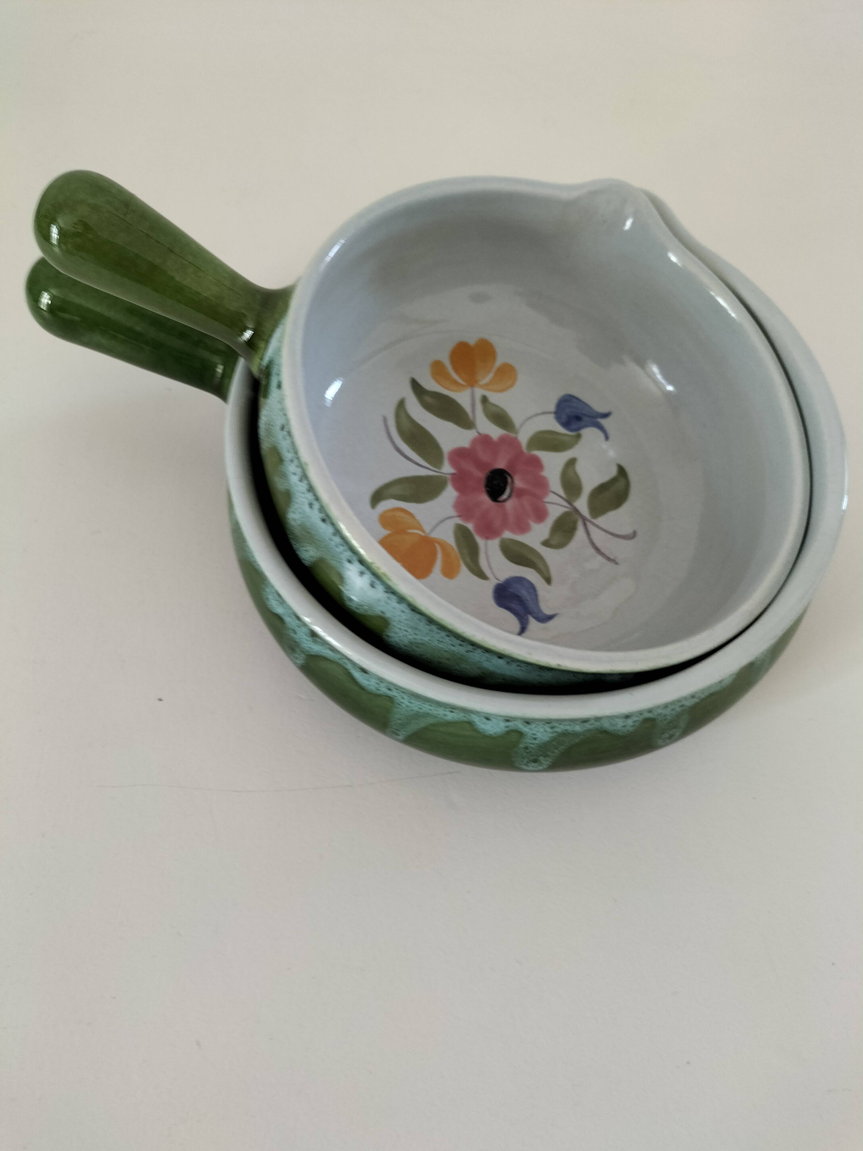 Duo of flowery caquelons