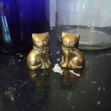 Pair of brass cats