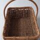 Old rectangular basket in wicker, rattan and woven straw