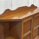 Early 20th-century English wall shelf in walnut.