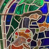 Stained glass panel representing a nineteenth century coronation