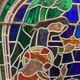 Stained glass panel representing a nineteenth century coronation