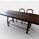 Industrial dining table with cast iron base