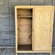 Sliding door wardrobe in raw wood