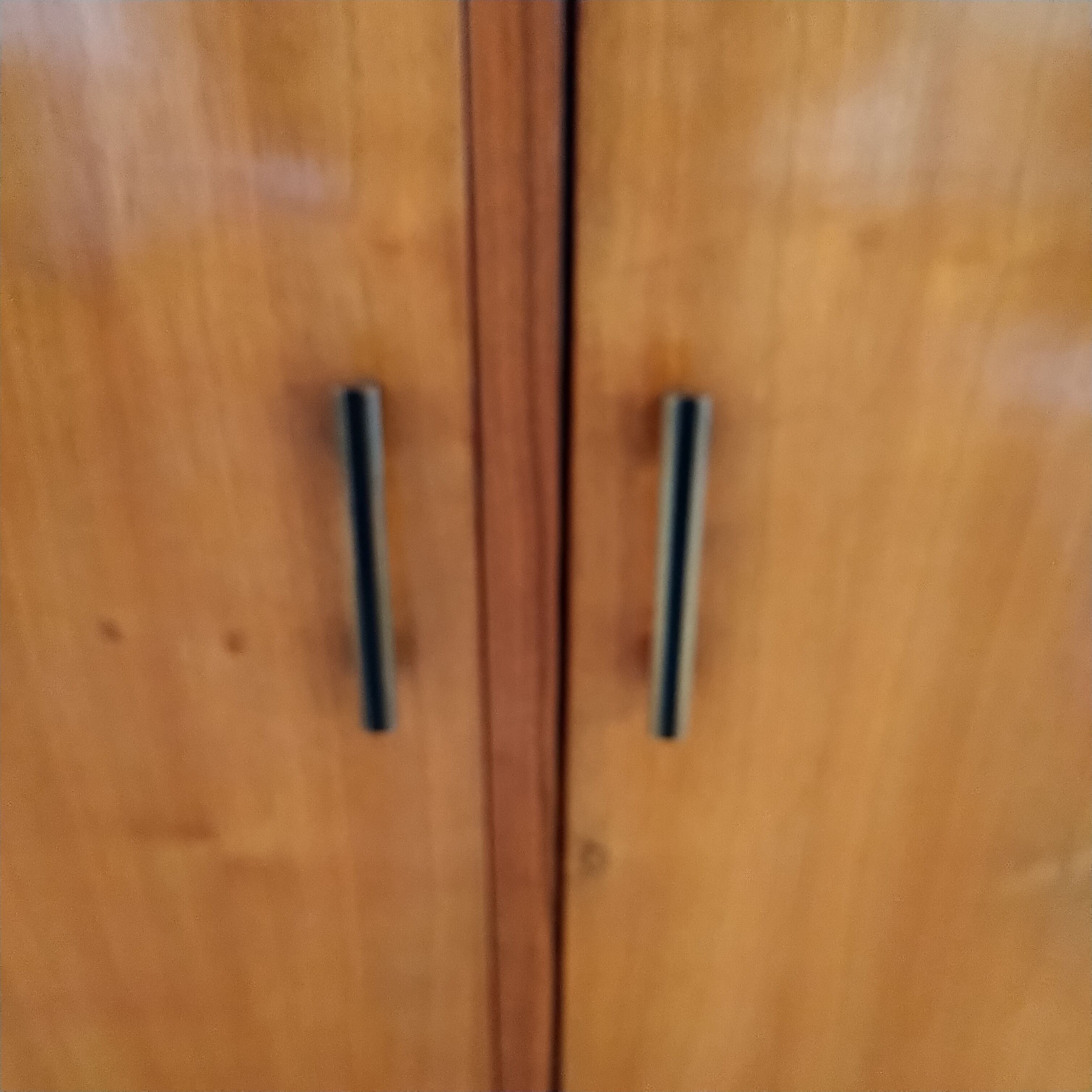 Asymmetrical cabinet