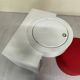 Bathroom toilet with a 70s pouf.
