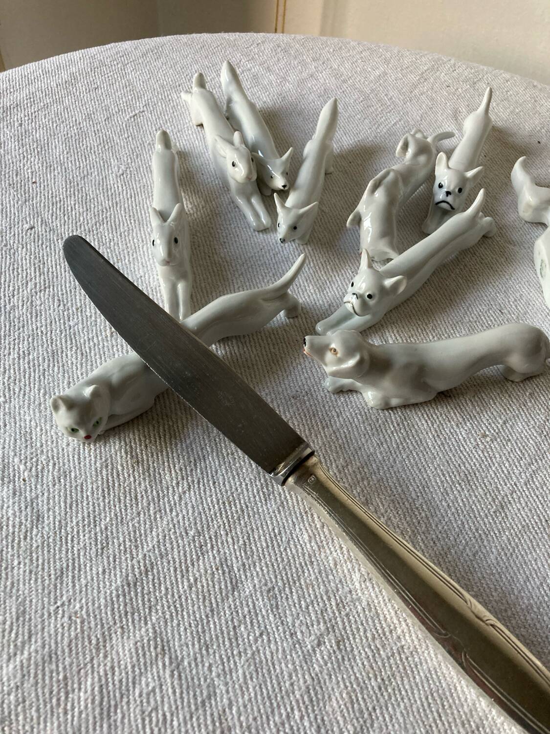 12 Art Deco porcelain knife holders