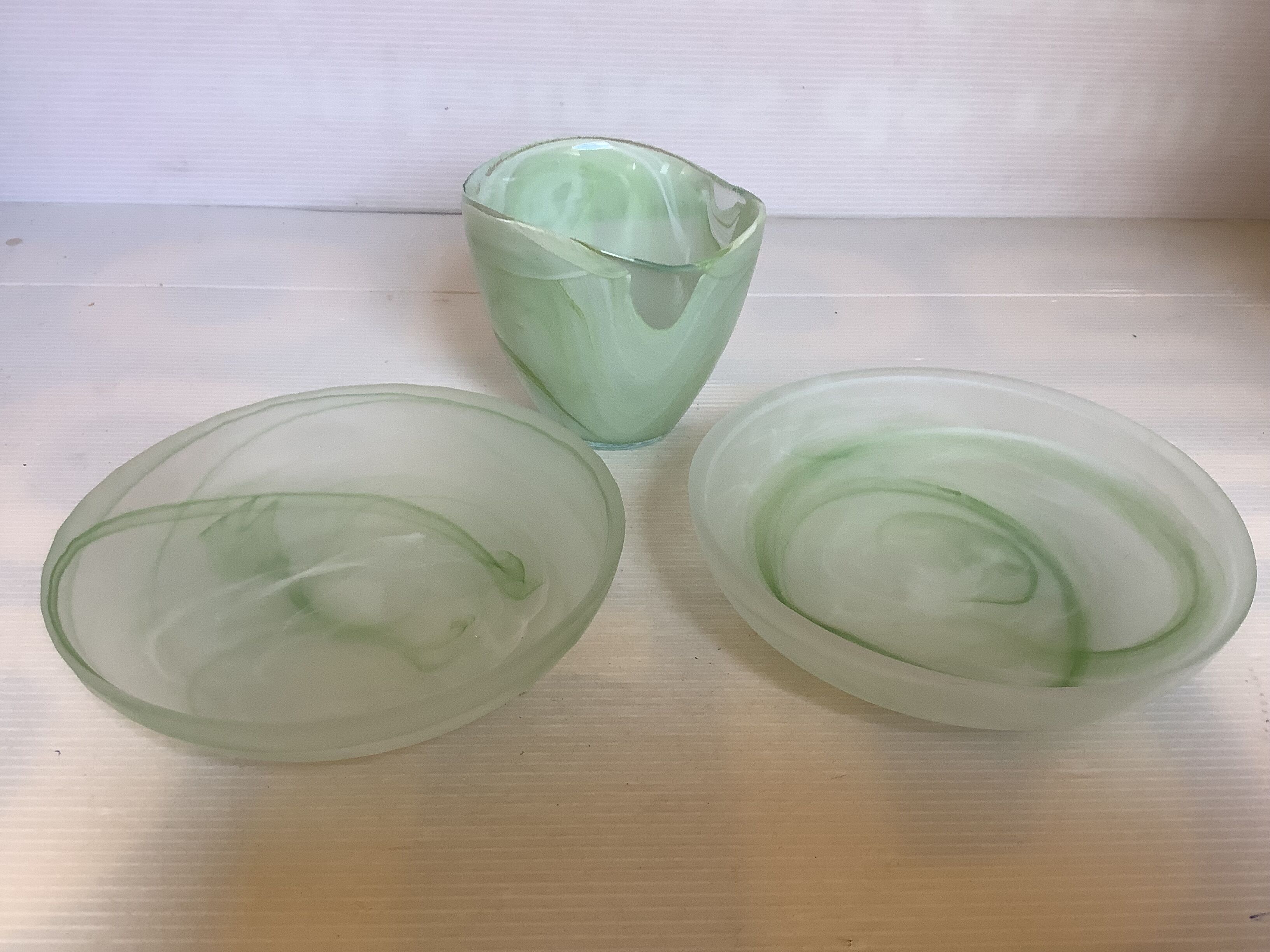 Trio of empty pockets bag makers green glass paste