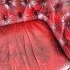 Red Chesterfield 2-seater sofa – oxblood leather