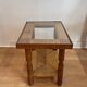 Wood, straw and glass side table, circa 1950