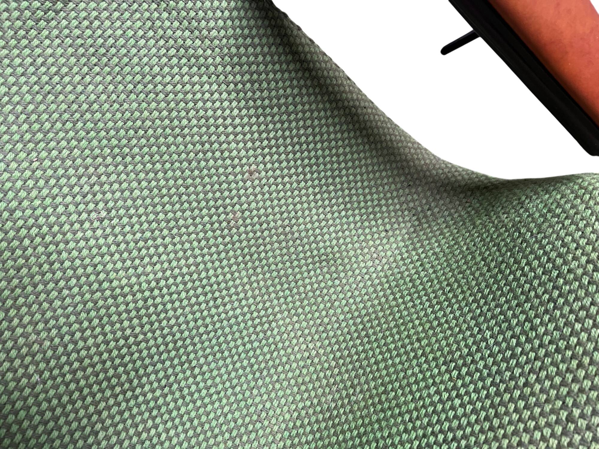Metal and green fabric armchair