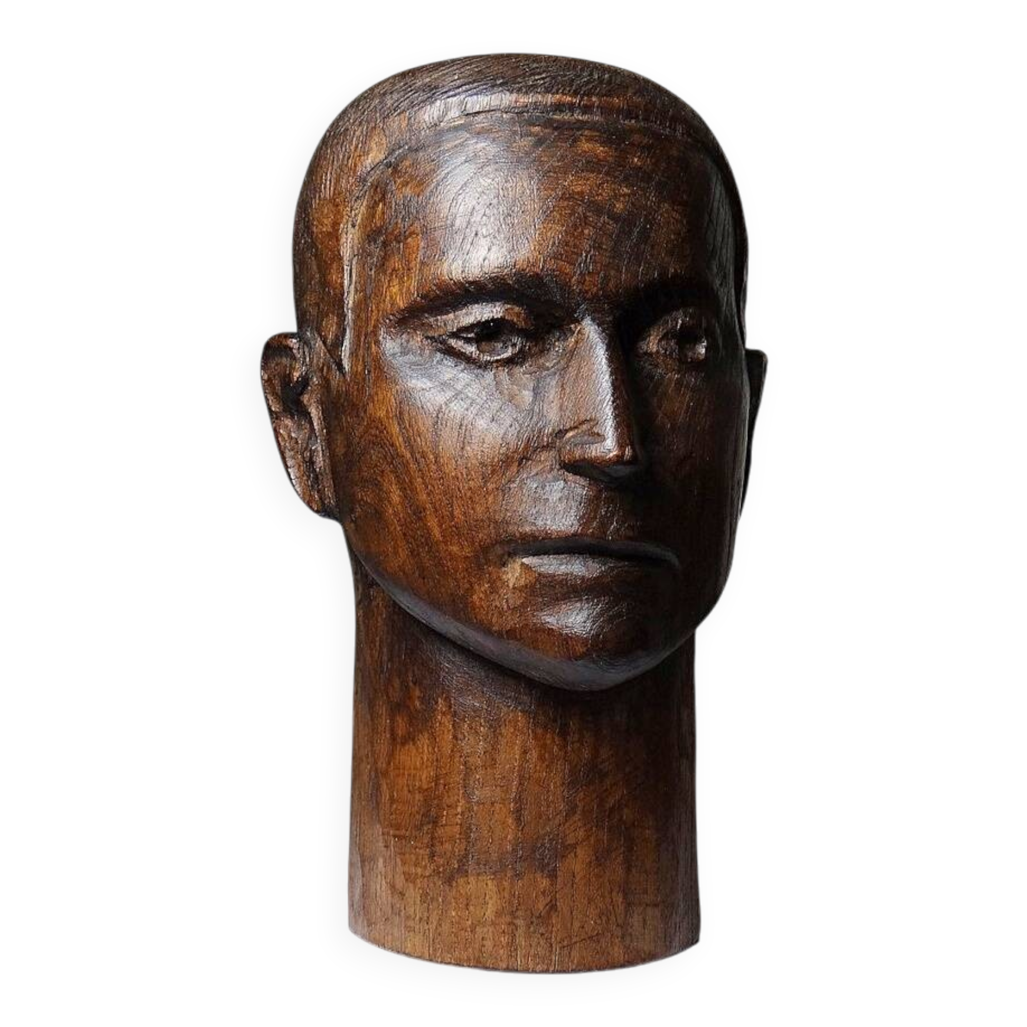Monoxyle wood sculpture of a man's head, vintage craftsmanship from the 1950s.