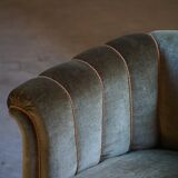 Mid-20th century, pair of Danish shell lounge chairs in green velvet, 1940s.