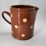 Old pitcher with polka dots savoyard pottery in glazed terracotta alsace