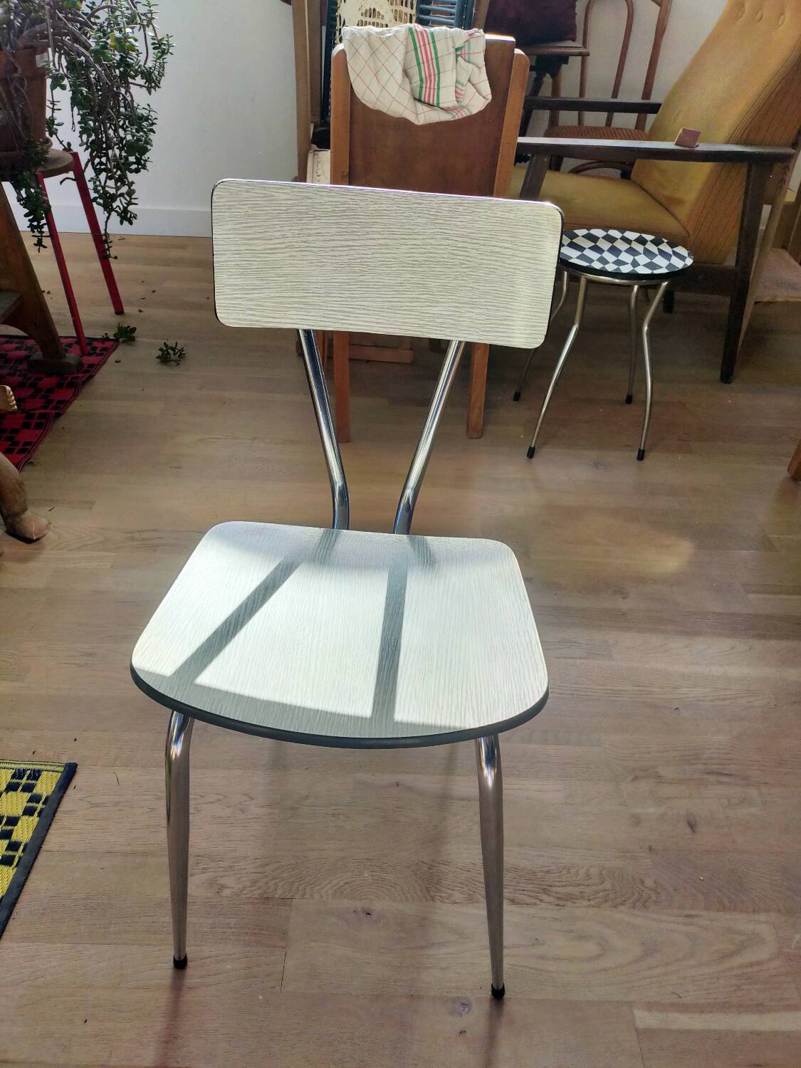 White and blue formica chair