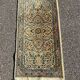 tapis persan 64cm par 133cm