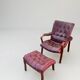 Scandinavian armchair with footrest
