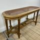 Banquette cannée dorée de style Louis XV