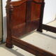 Walnut bed and walnut magnifying glass nineteenth century