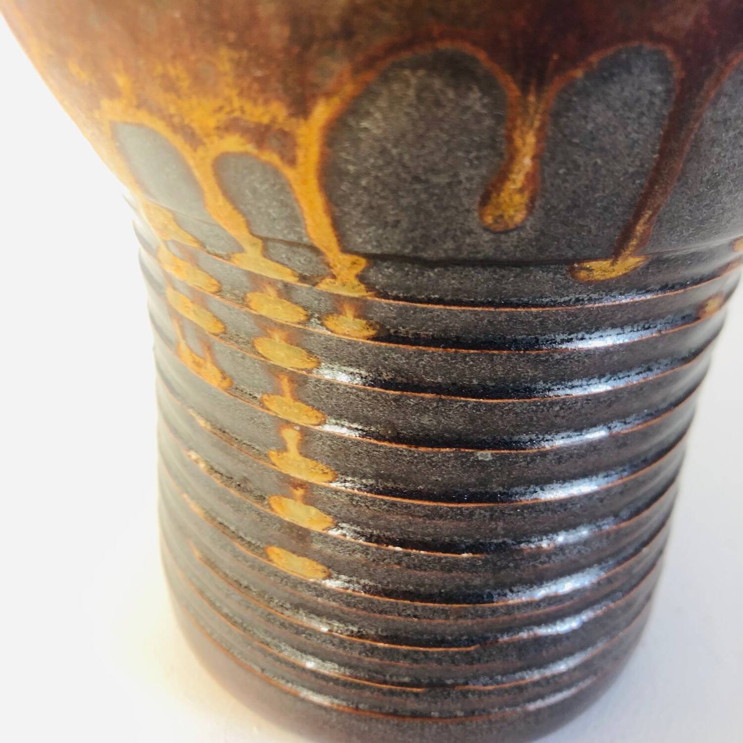 Metallic brown ceramic torso vase