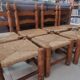4 chairs and stools, brutalist art, straw and wood