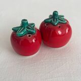 Vintage tomato salt and pepper shakers in slip