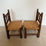 Pair of low chairs in turned wood