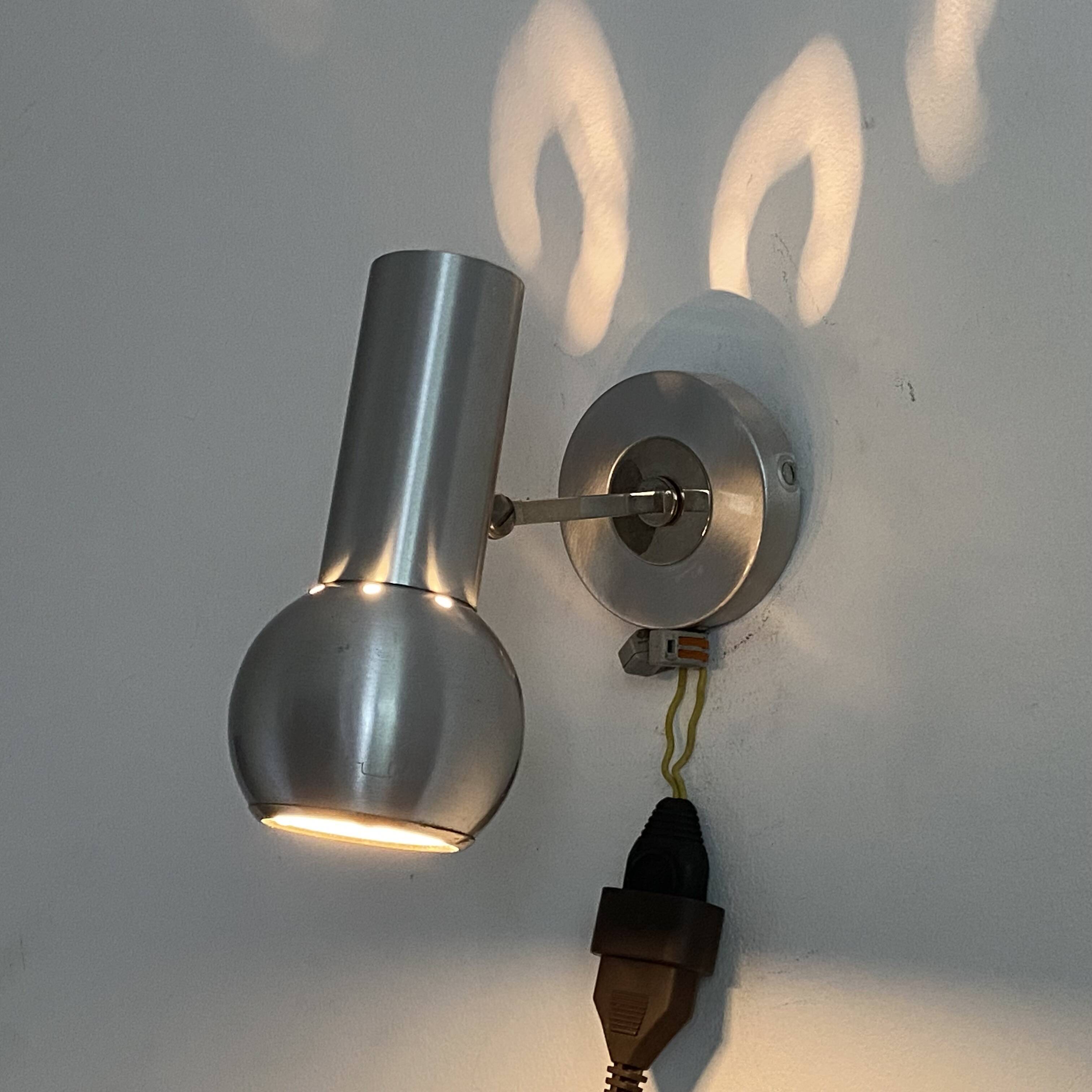 Pair of Eye Ball wall lights. 1970. Brushed stainless steel.