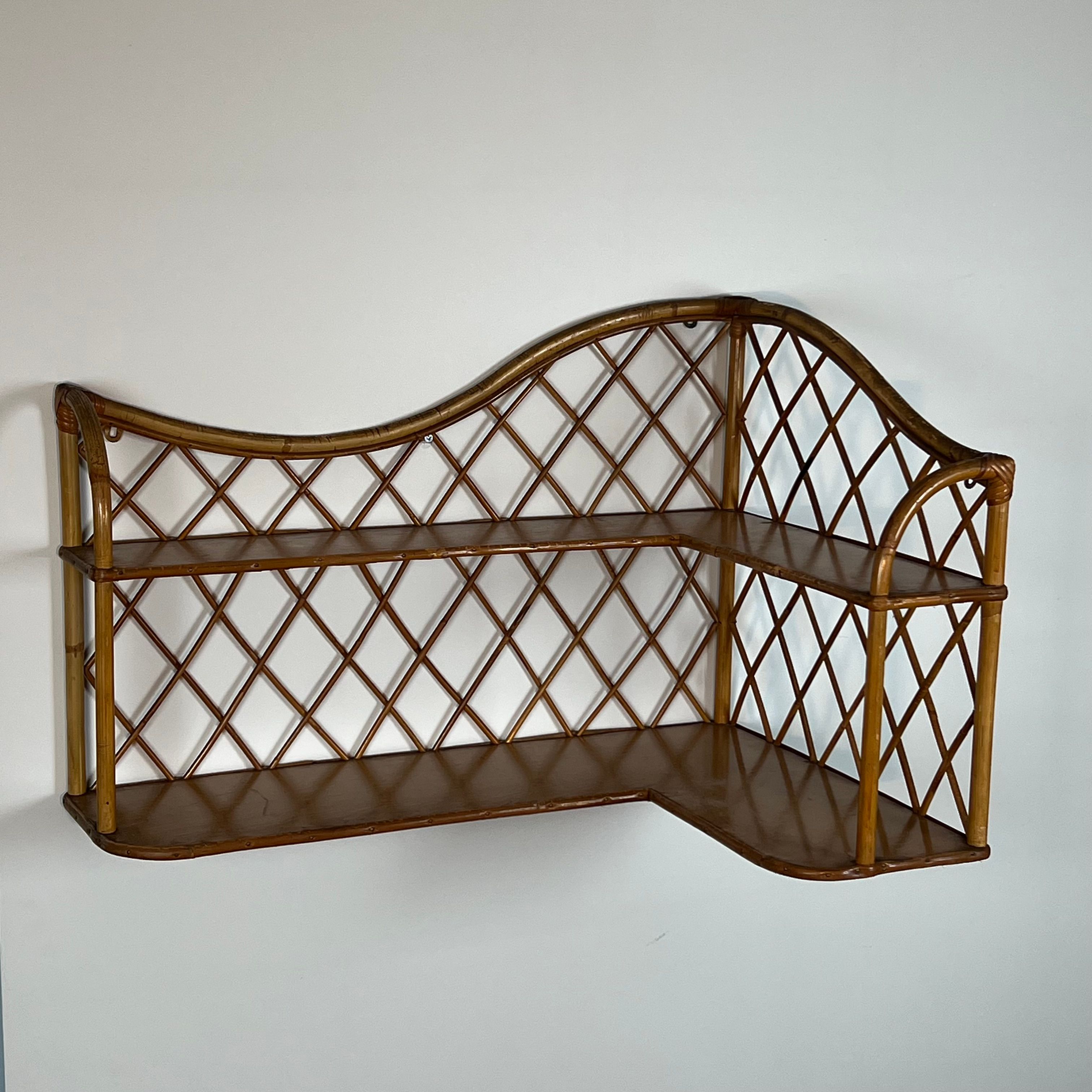 Corner wall shelf in rattan attributed to Audoux-Minet.