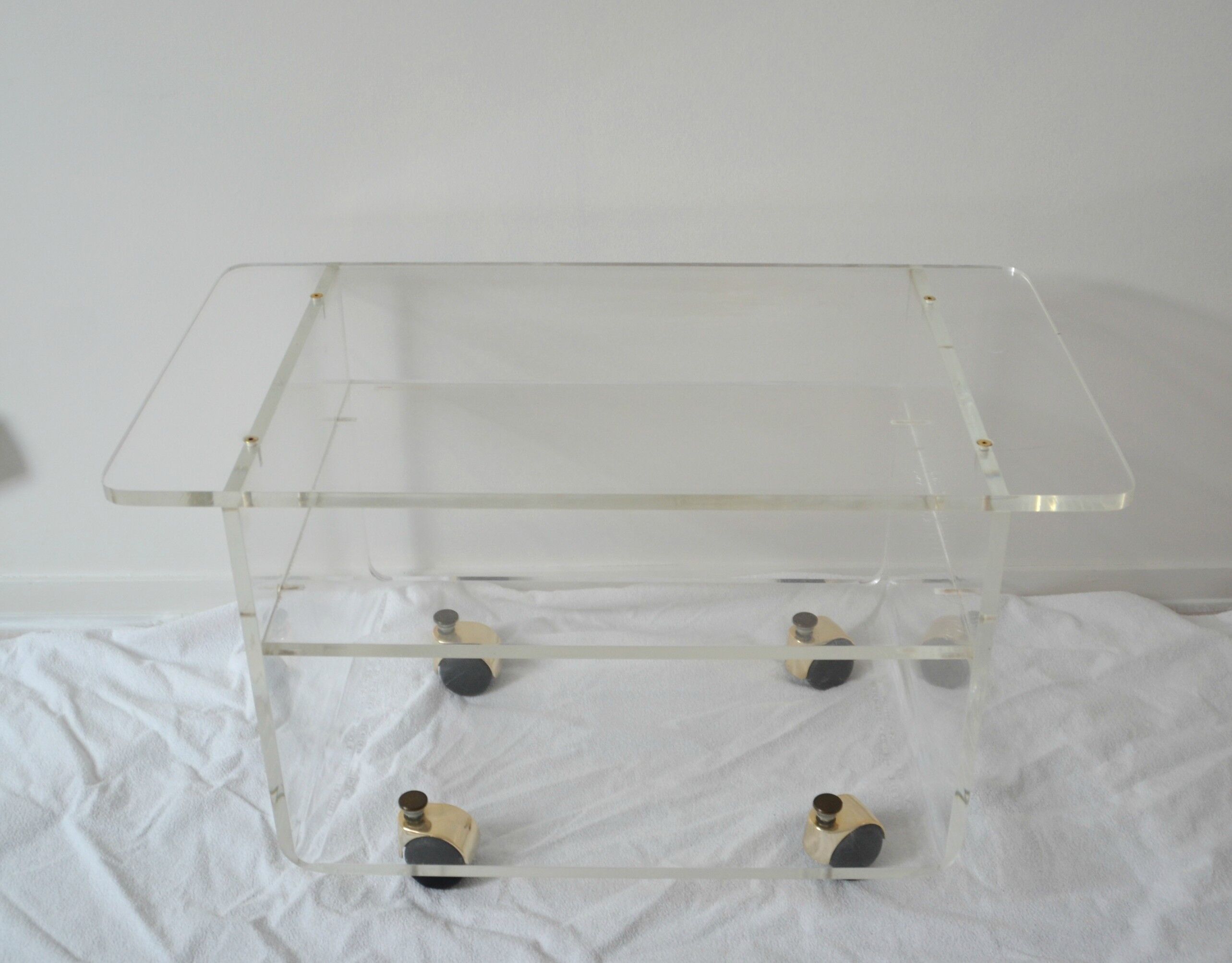 The swamp invisible Plexiglas side table