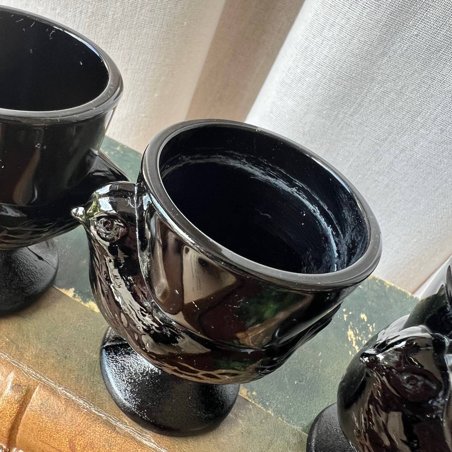 4 "hen" egg cups in black opaline