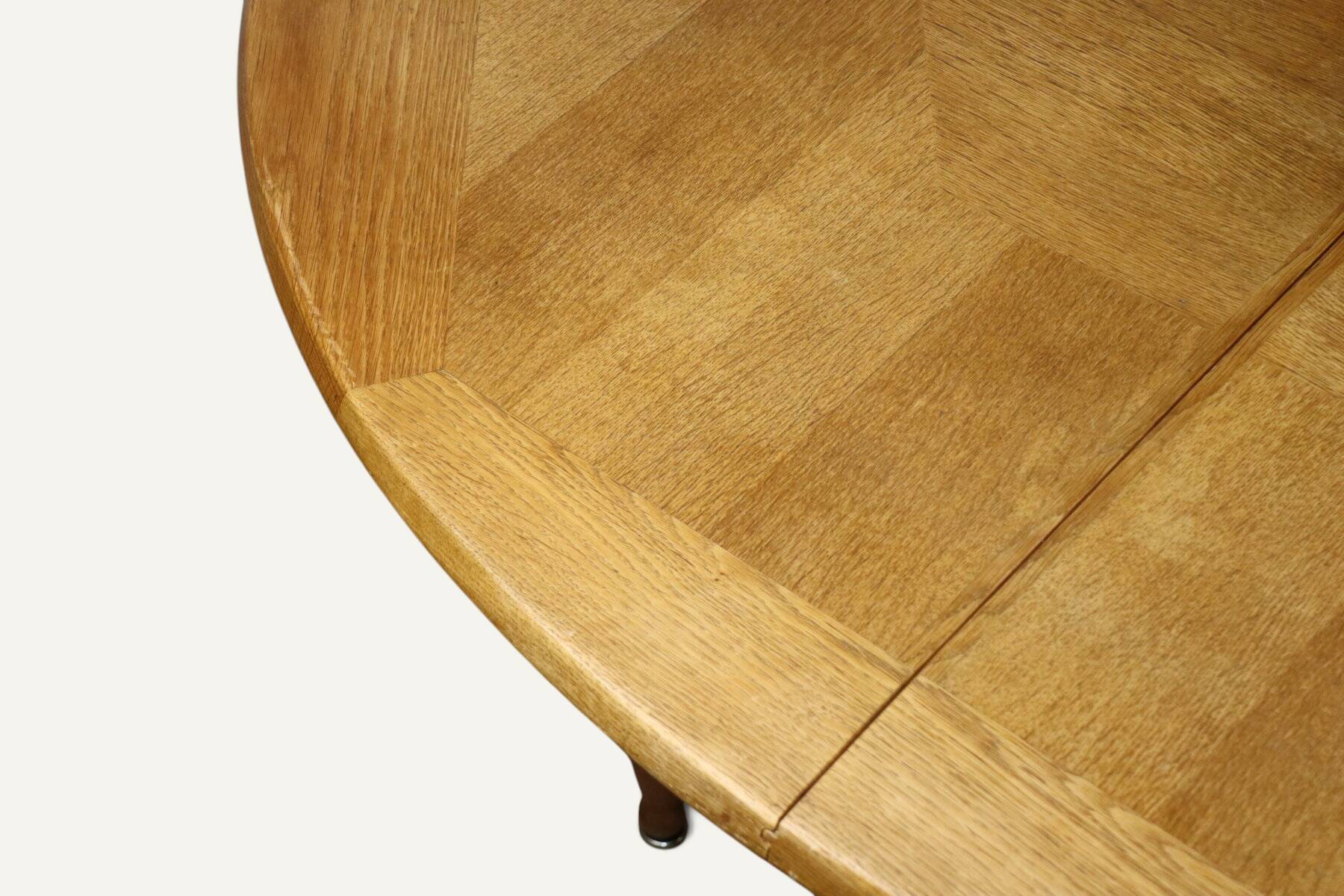 Extendable dining table in oak by Guillerme and Chambron - 1960s