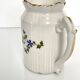 Pot à lait au décor de barbeaux