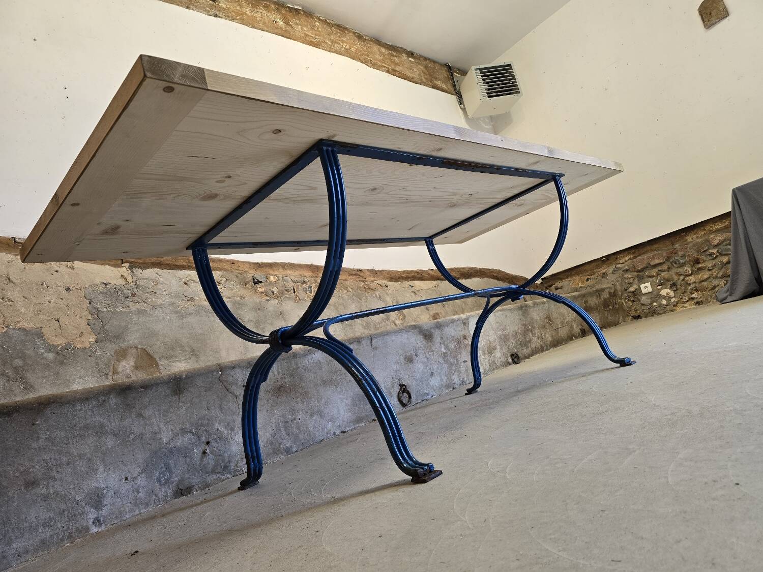 Wrought iron and solid wood table