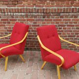 Pair of red armchairs model 6953 by Jaroslav Smidek published by TON