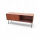 Vintage low sideboard with sliding doors and hairpin legs.