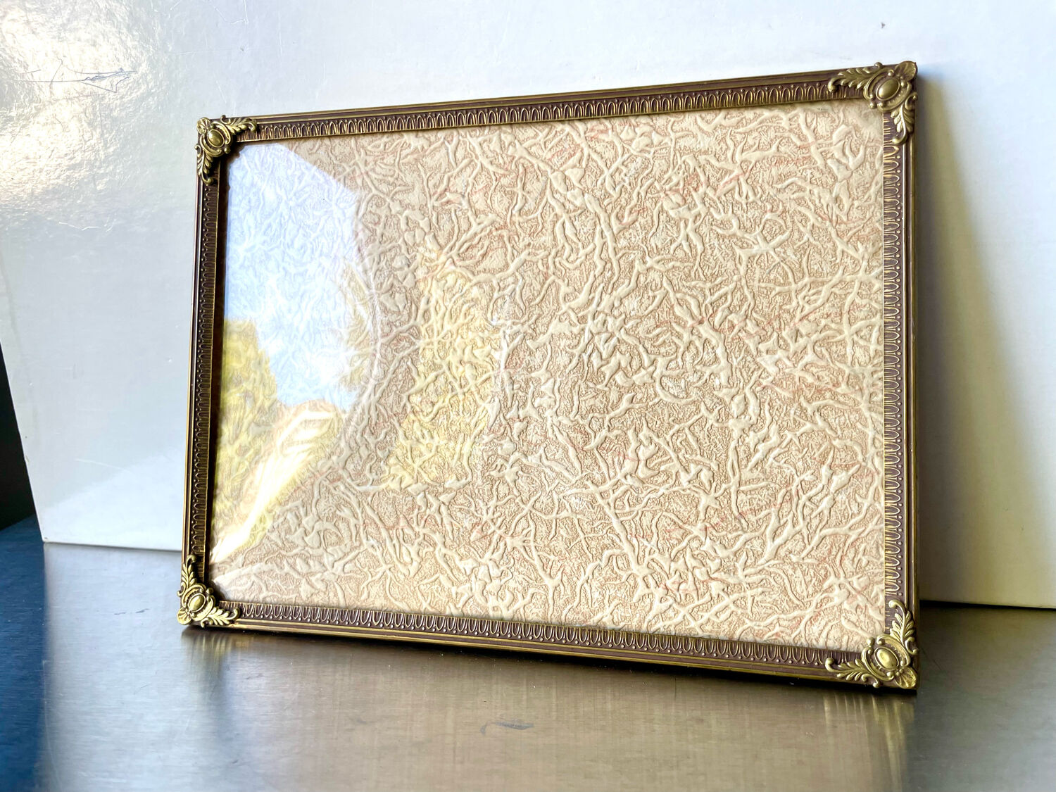 Metal vintage frame in gold colored brass