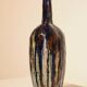 Vase en céramique émaillé multicolore signé