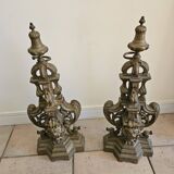 Paire de chenets en fonte et bronze argenté
