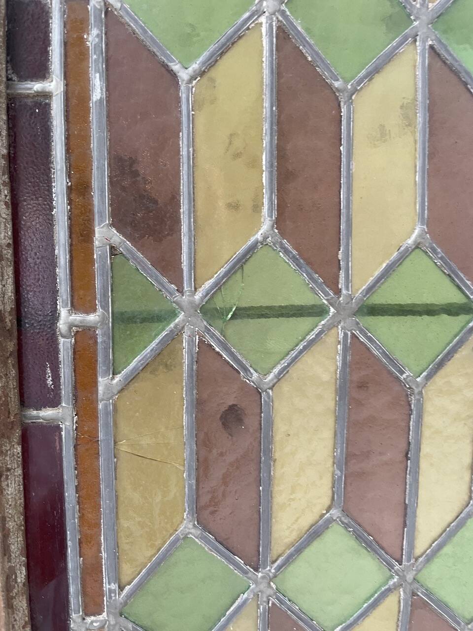 Old stained glass window in metal and glass 1900