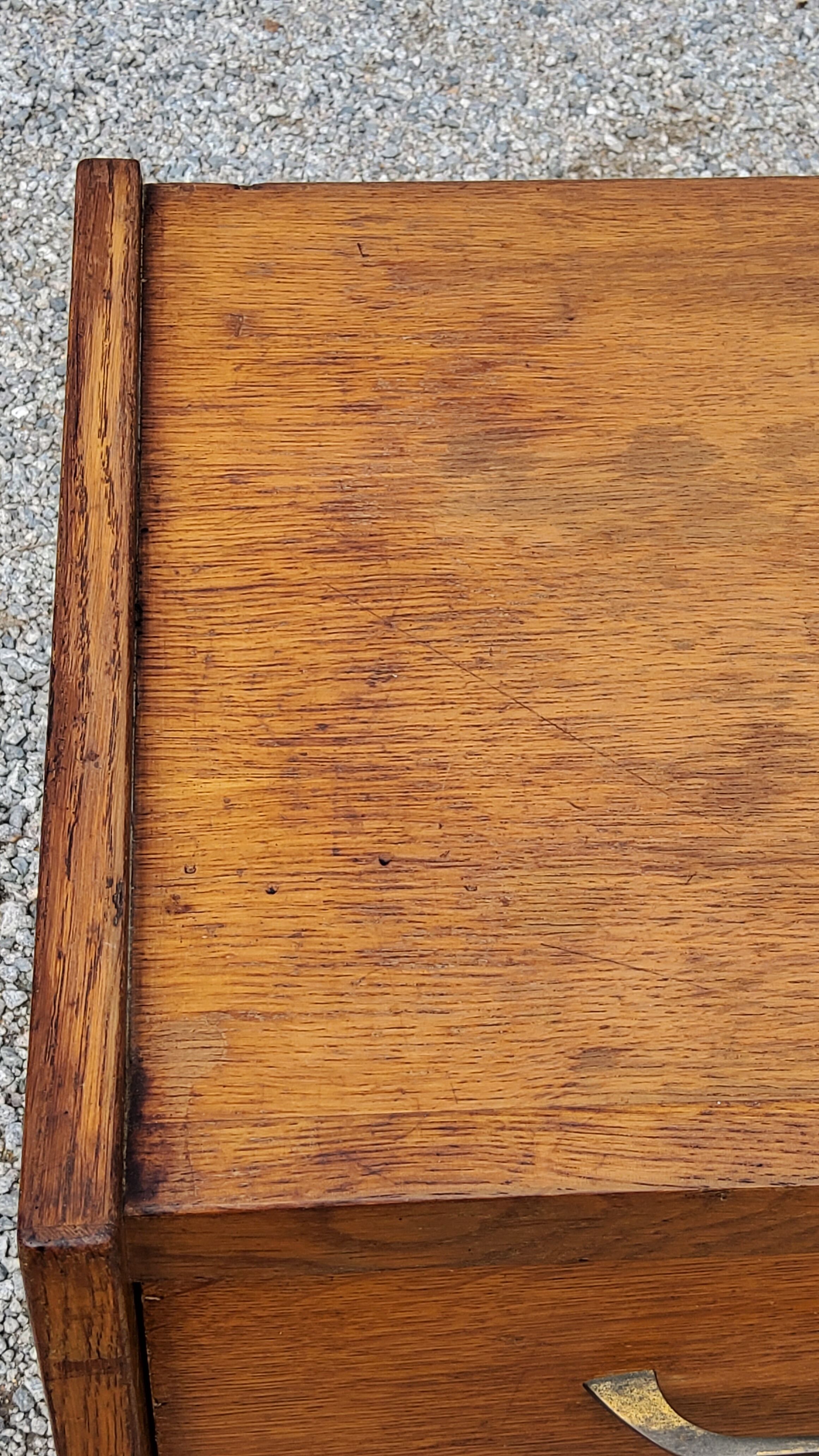Chest of drawers of the 50s in golden blond oak 5 drawers conical feet
