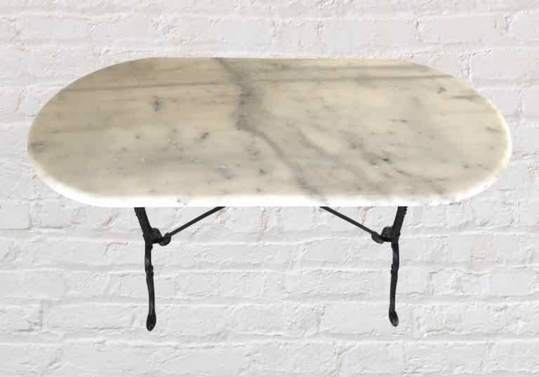 Oval marble and cast iron bistro table