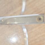 Dining table with smoked glass top and chrome base.