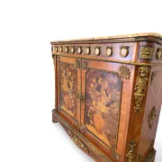An antique French Louis XVI-style marble-top side cabinet