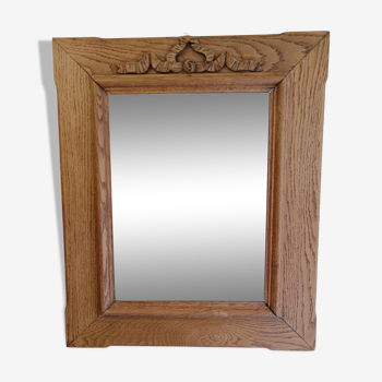 Antique mirror with knot in light oak