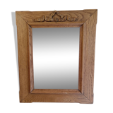 Antique mirror with knot in light oak